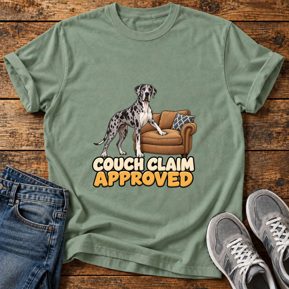 Couch Claim Approved Great Dane graphic T-shirt in Sage, shown on a flat-lay shirt mockup