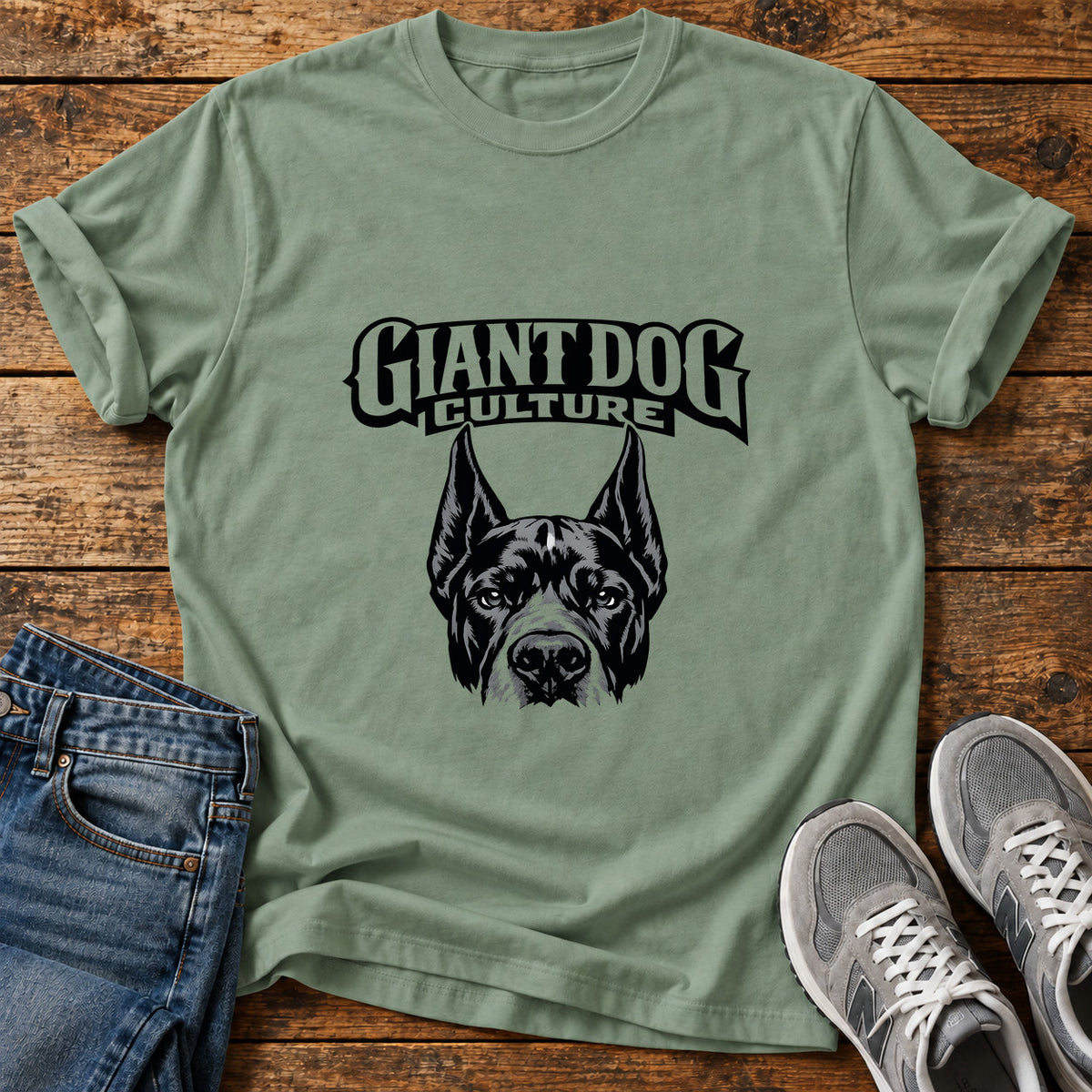 Giant Dog Culture Great Dane graphic T-shirt in Sage, shown on a flat-lay shirt mockup