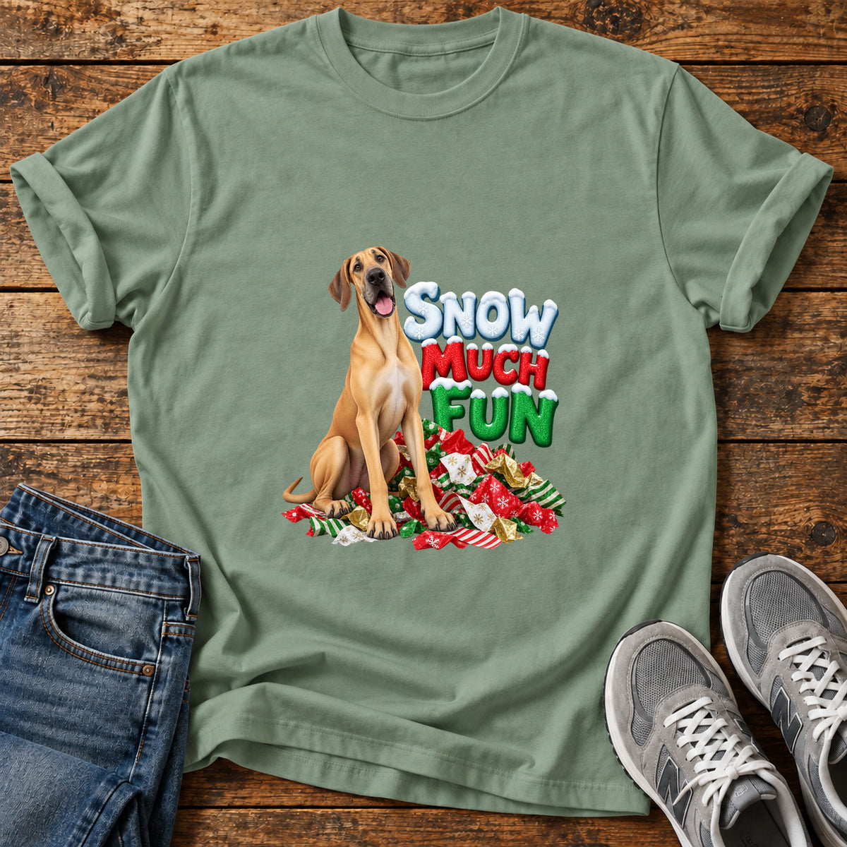 Snow Much Fun Great Dane graphic T-shirt in Sage, shown on a flat-lay shirt mockup