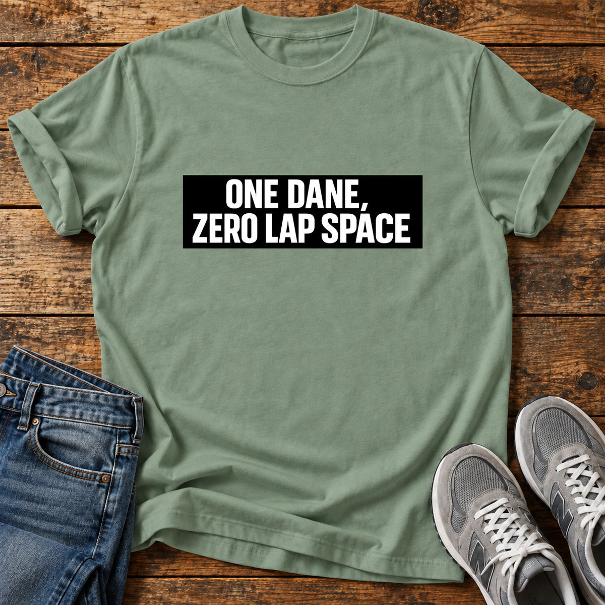 One Dane Zero Great Dane graphic T-shirt in Sage, shown on a flat-lay shirt mockup
