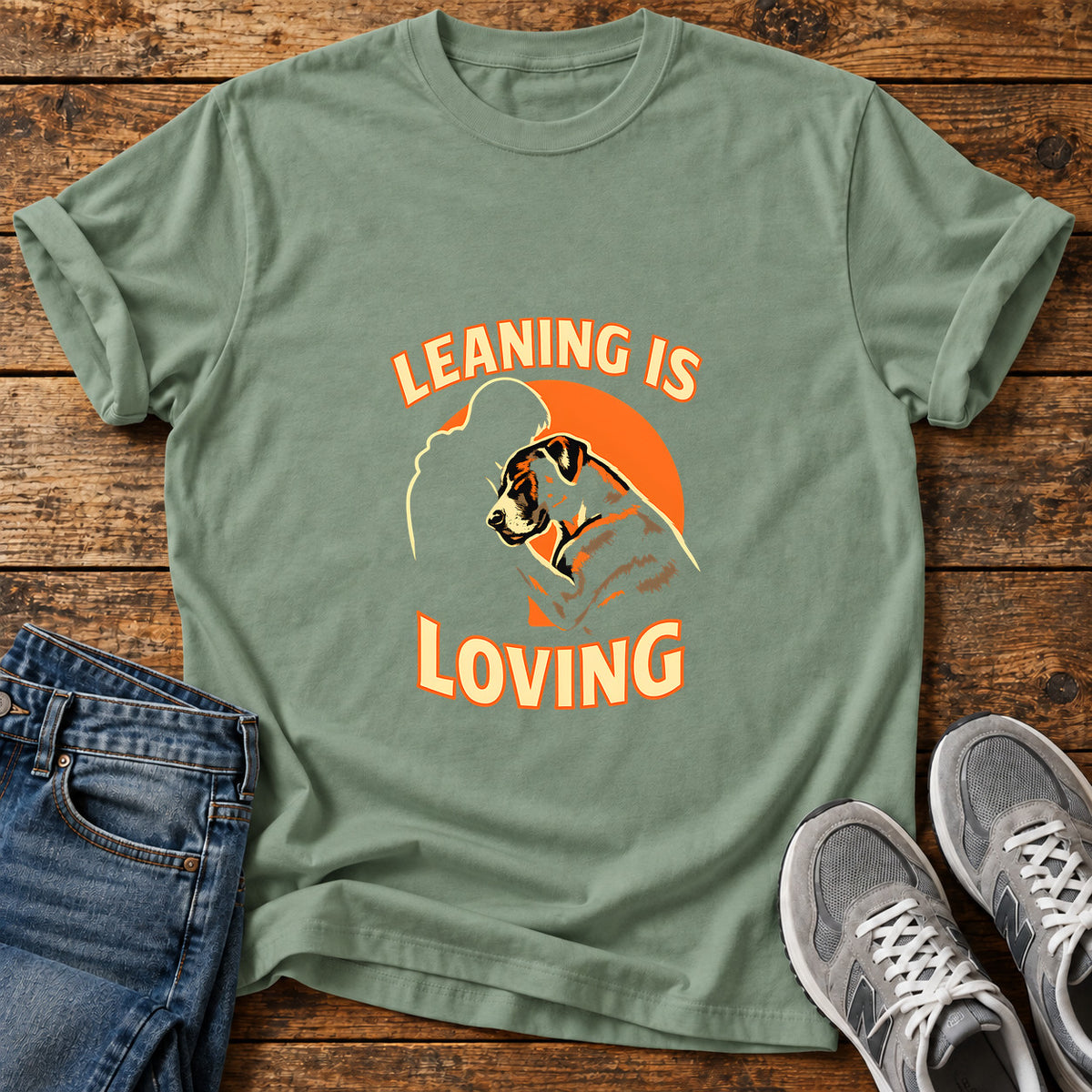 Leaning Is Loving Great Dane graphic T-shirt in Sage, shown on a flat-lay shirt mockup