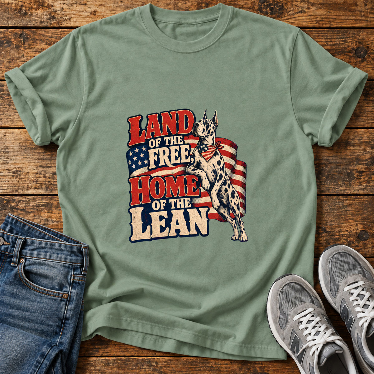 Land Of Lean Great Dane graphic T-shirt in Sage, shown on a flat-lay shirt mockup