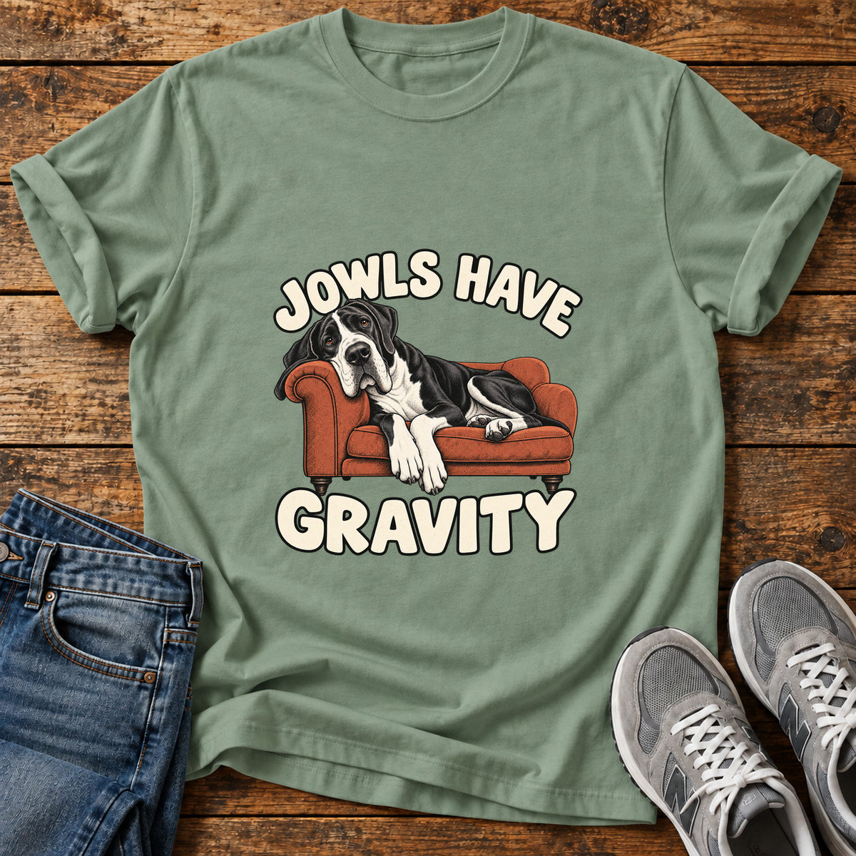 Jowls Gravity Great Dane graphic T-shirt in Sage, shown on a flat-lay shirt mockup