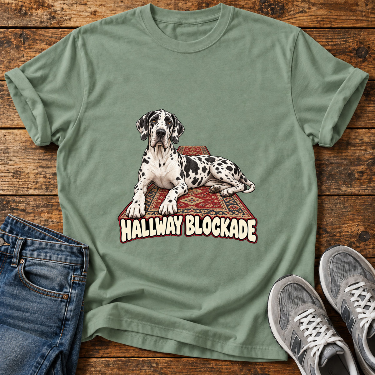 Hallway Blockade Great Dane graphic T-shirt in Sage, shown on a flat-lay shirt mockup