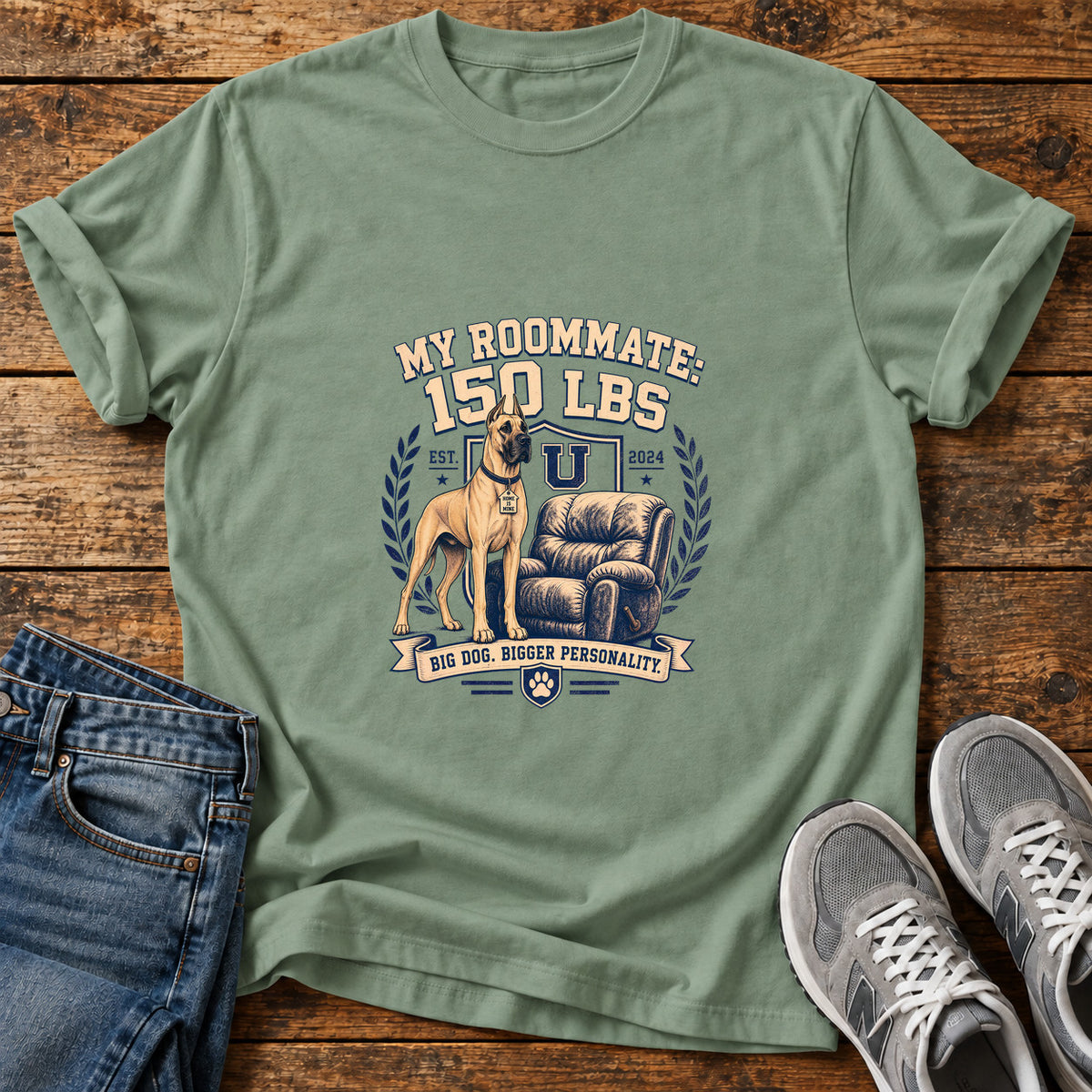 Roommate Pup Great Dane graphic T-shirt in Sage, shown on a flat-lay shirt mockup