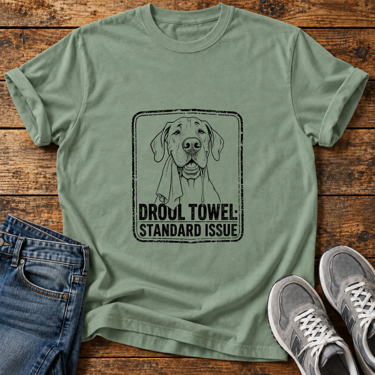 Drool Towel Great Dane graphic T-shirt in Sage, shown on a flat-lay shirt mockup