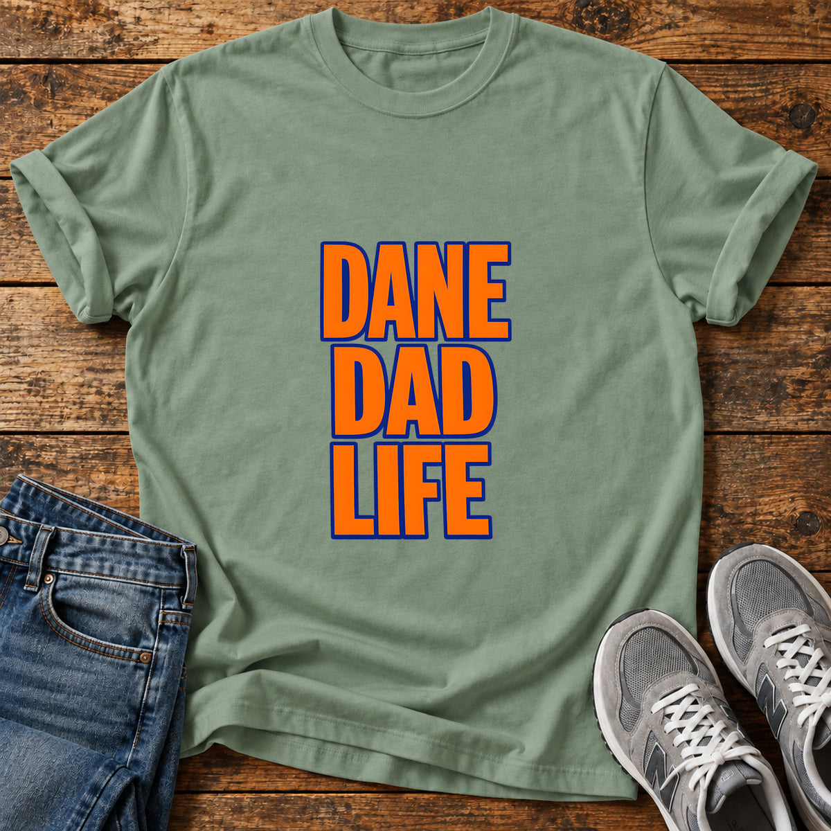 Dane Dad Life Great Dane graphic T-shirt in Sage, shown on a flat-lay shirt mockup