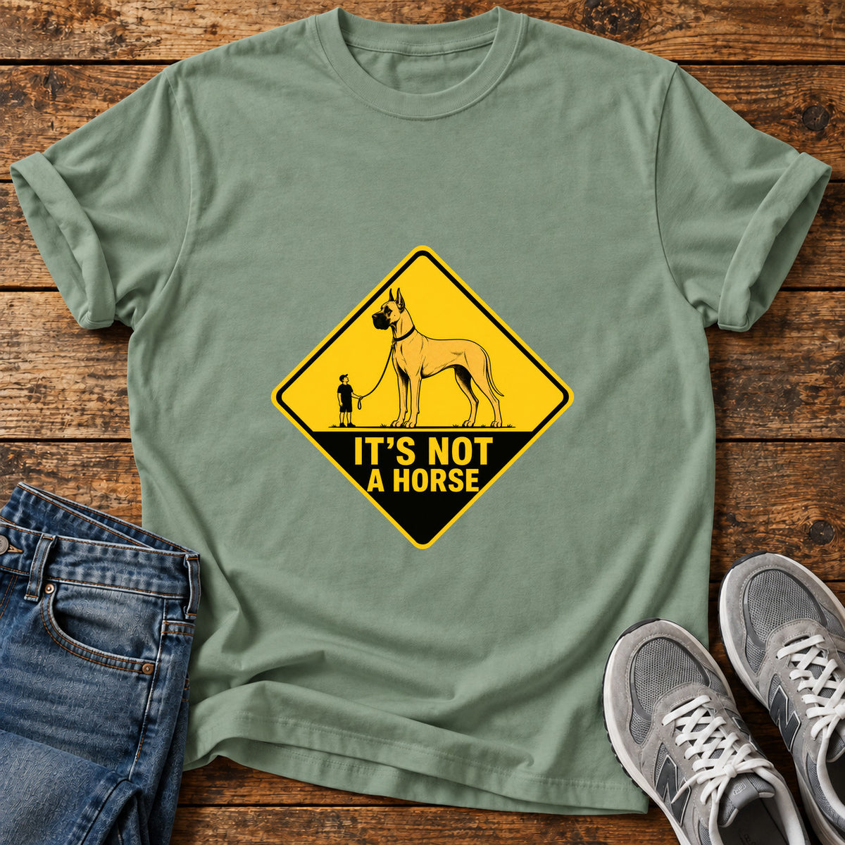 It's Not Horse Great Dane graphic T-shirt in Sage, shown on a flat-lay shirt mockup