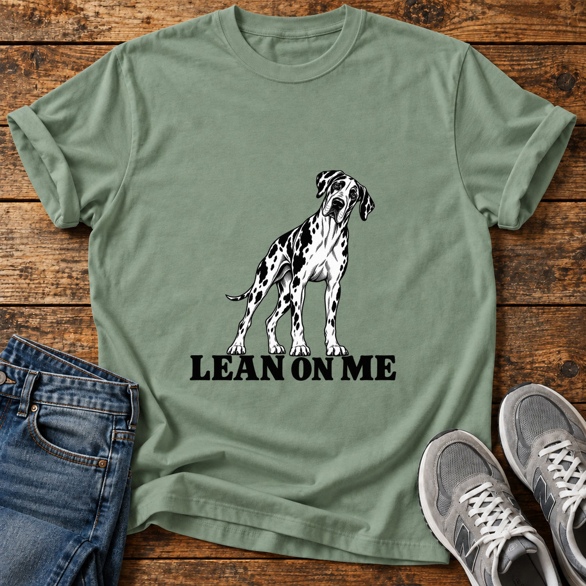 Lean On Me Great Dane graphic T-shirt in Sage, shown on a flat-lay shirt mockup