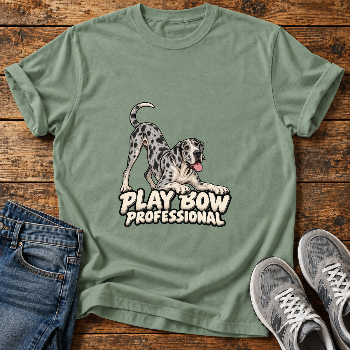 Play Bow Pro Great Dane graphic T-shirt in Sage, shown on a flat-lay shirt mockup