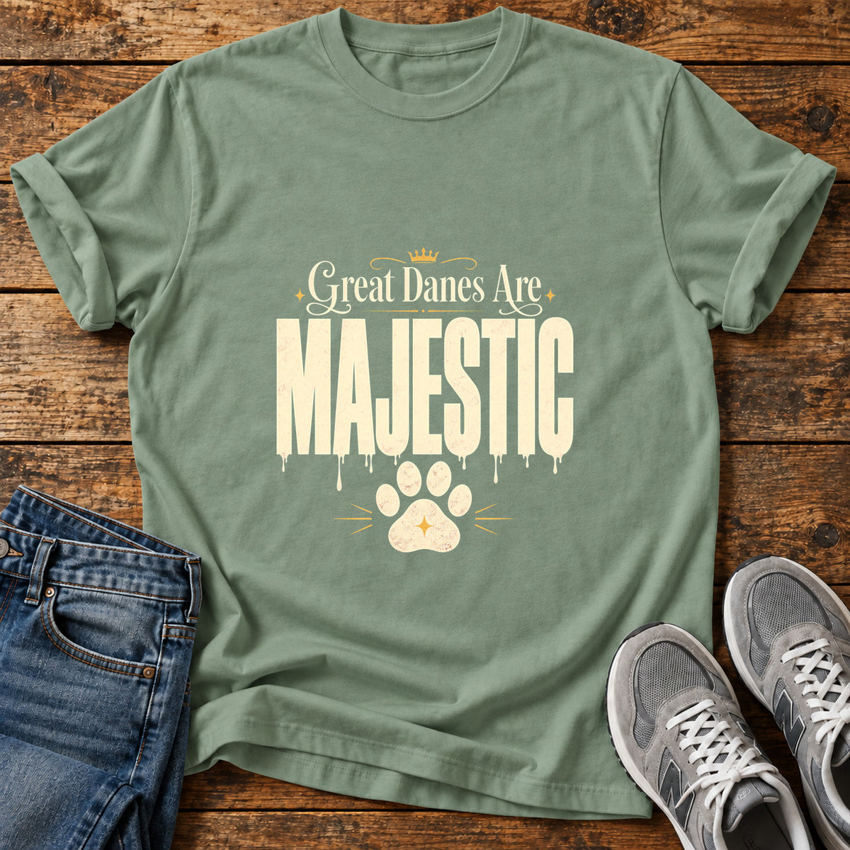 Majestic Danes Great Dane graphic T-shirt in Sage, shown on a flat-lay shirt mockup