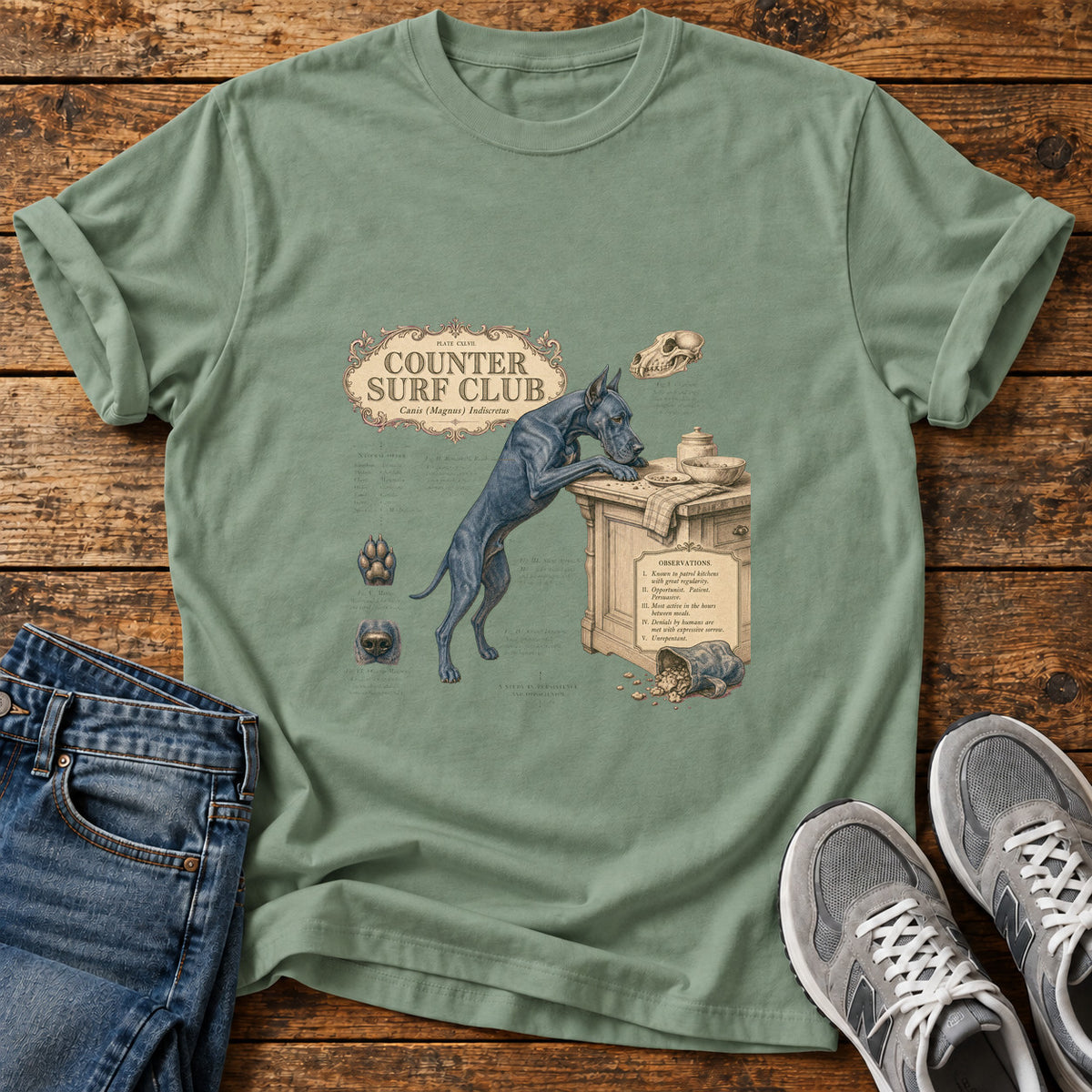 Counter Surf Club Great Dane graphic T-shirt in Sage, shown on a flat-lay shirt mockup