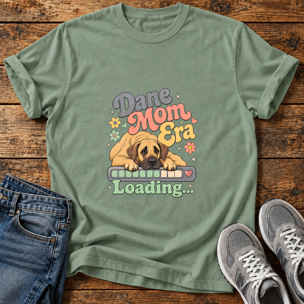 Dane Mom Loading Great Dane graphic T-shirt in Sage, shown on a flat-lay shirt mockup