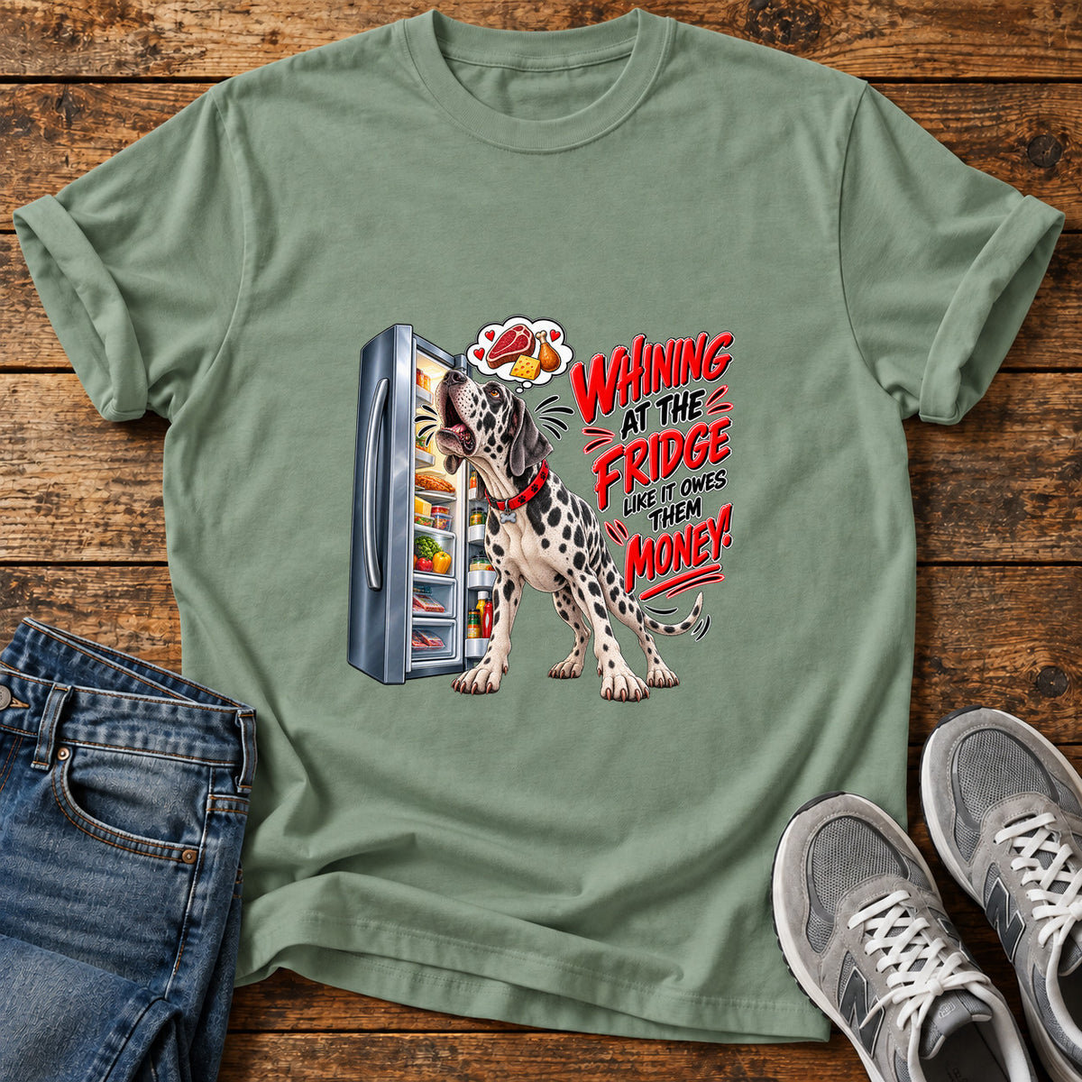 Whining Fridge Dog Great Dane graphic T-shirt in Sage, shown on a flat-lay shirt mockup