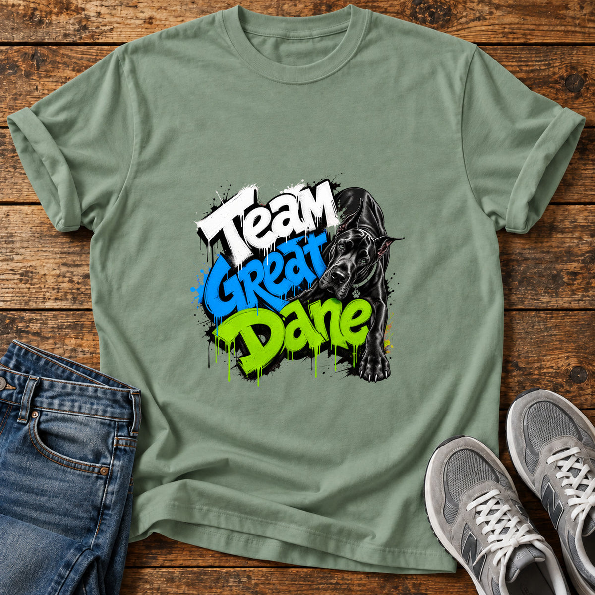 Team Great Dane graphic T-shirt in Sage, shown on a flat-lay shirt mockup