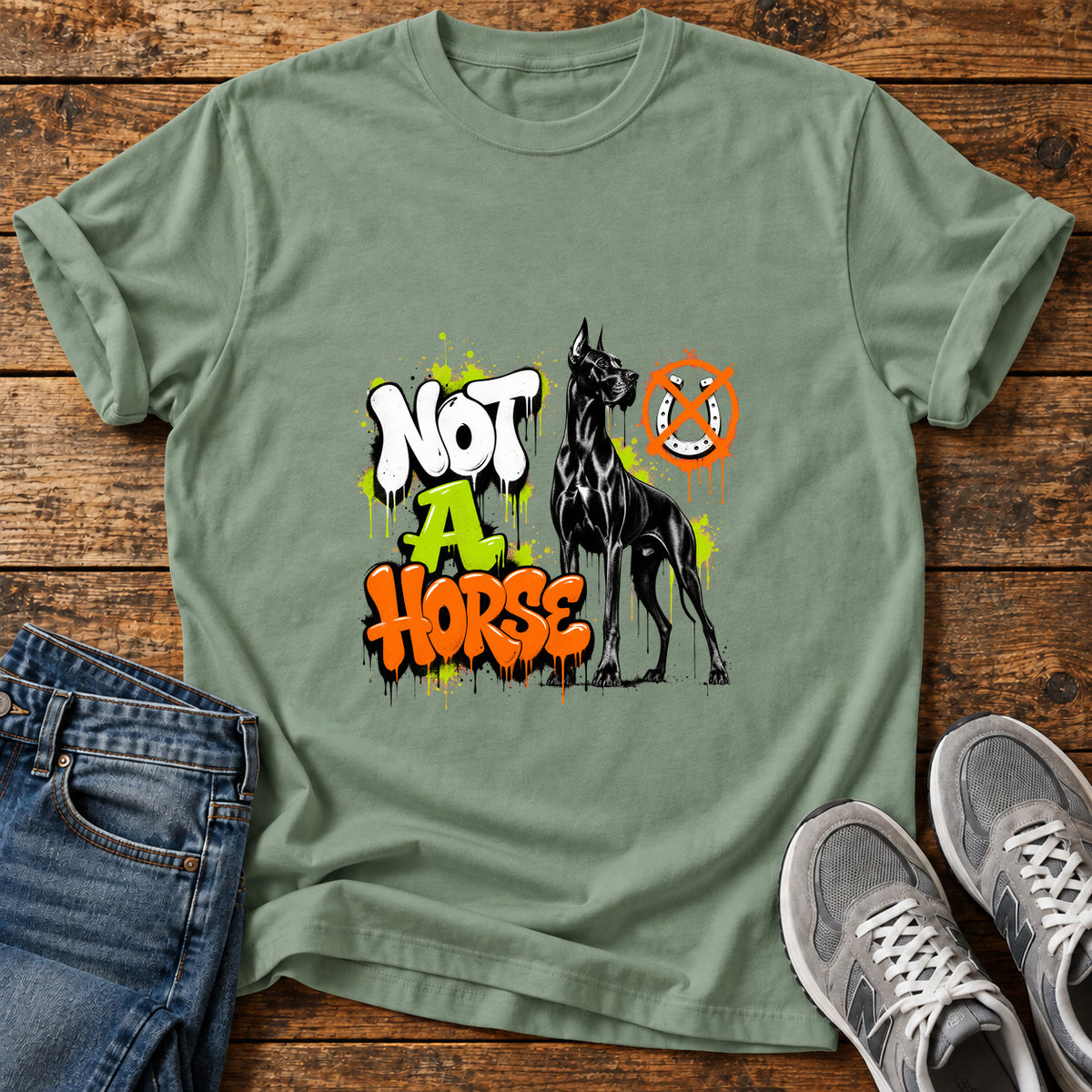 Not A Horse Great Dane graphic T-shirt in Sage, shown on a flat-lay shirt mockup