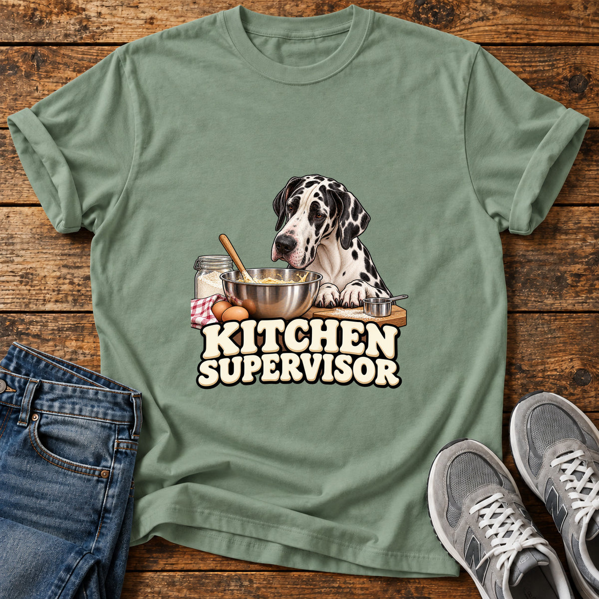 Kitchen Supervisor Great Dane graphic T-shirt in Sage, shown on a flat-lay shirt mockup
