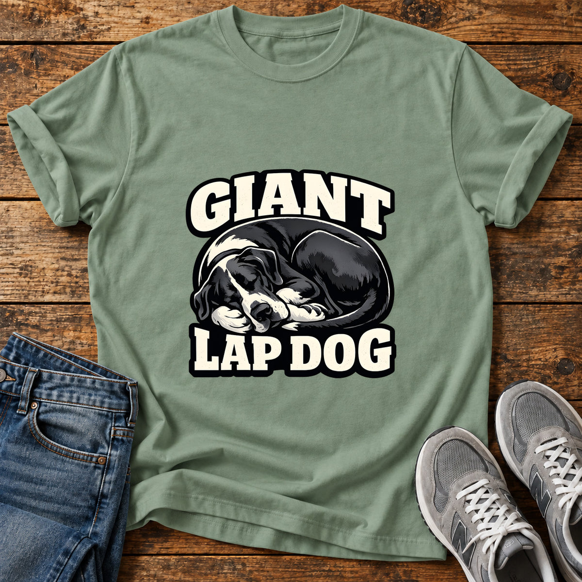 Giant Lap Dog Great Dane graphic T-shirt in Sage, shown on a flat-lay shirt mockup