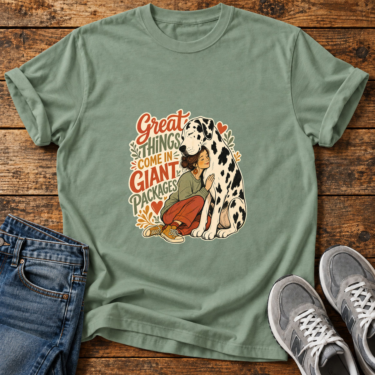 Giant Packages Great Dane graphic T-shirt in Sage, shown on a flat-lay shirt mockup