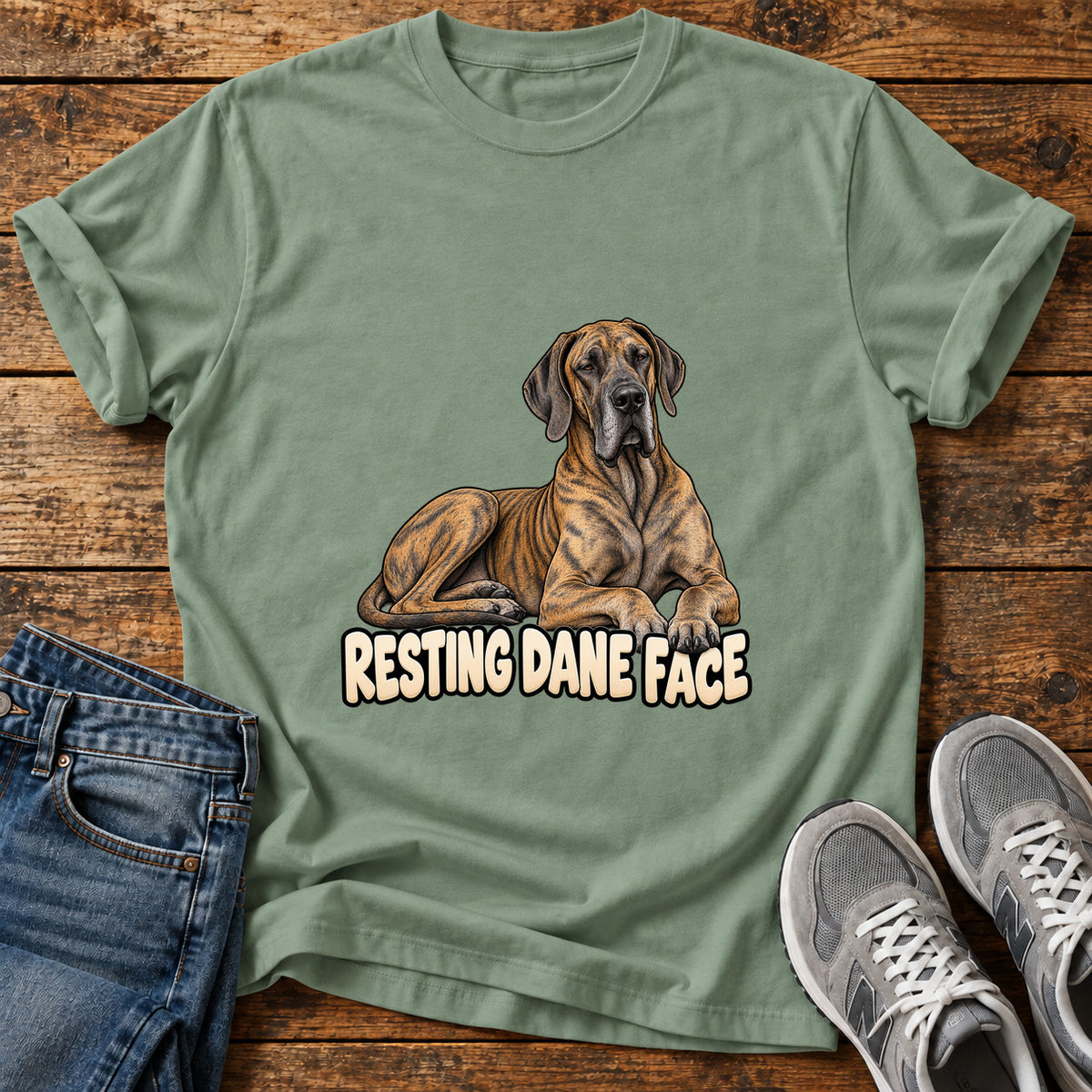 Resting Dane Face Great Dane graphic T-shirt in Sage, shown on a flat-lay shirt mockup