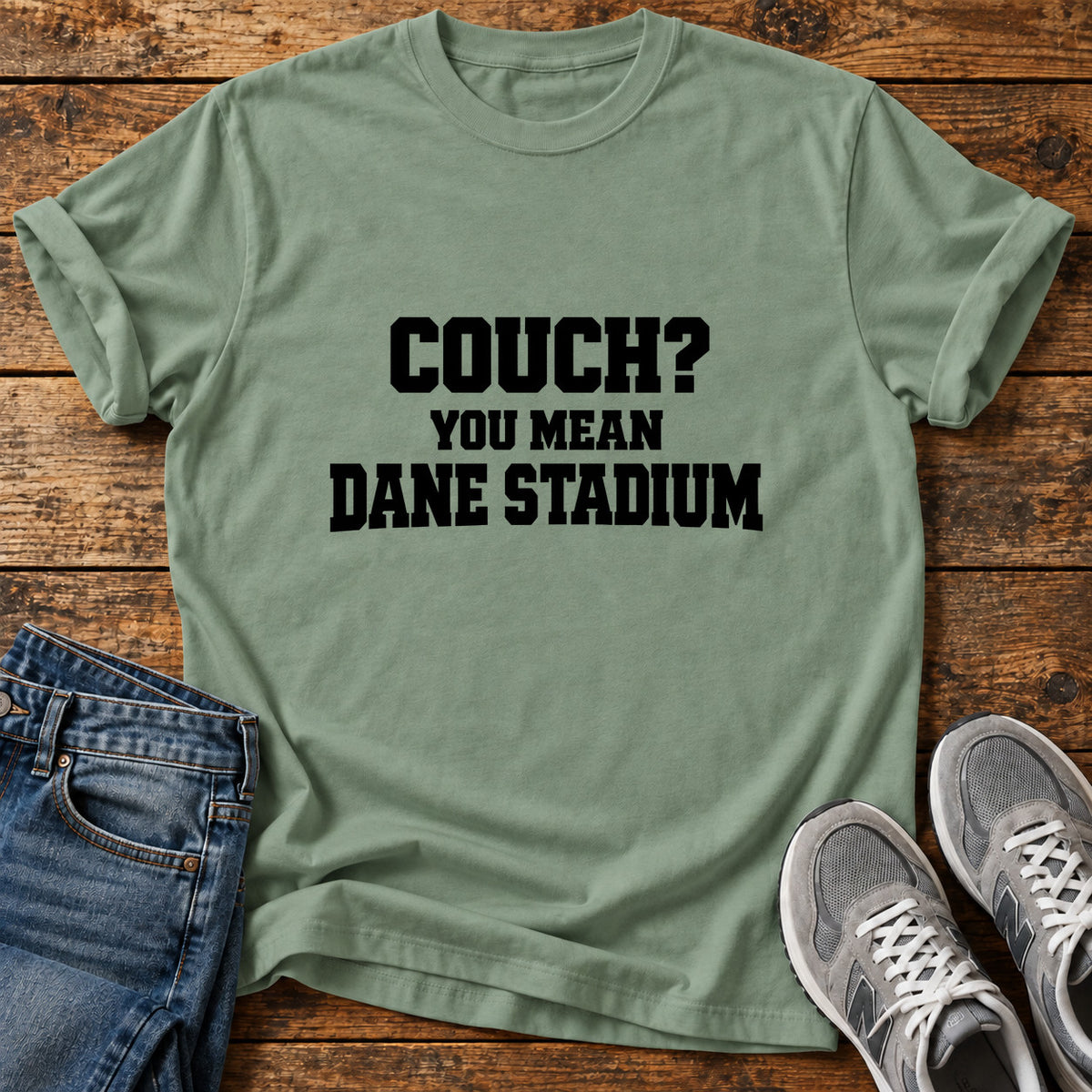 Couch Stadium Great Dane graphic T-shirt in Sage, shown on a flat-lay shirt mockup