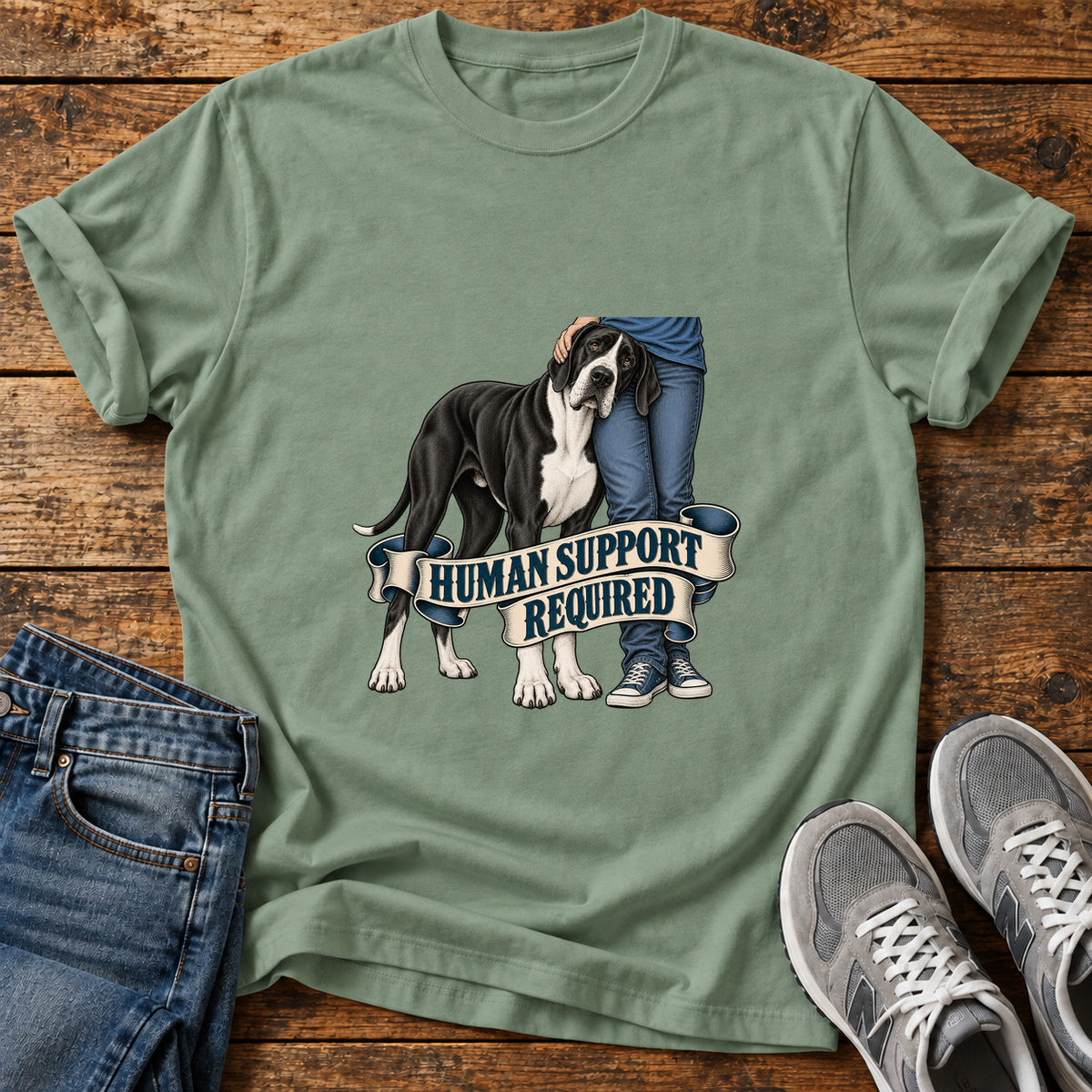 Human Support Required Great Dane graphic T-shirt in Sage, shown on a flat-lay shirt mockup