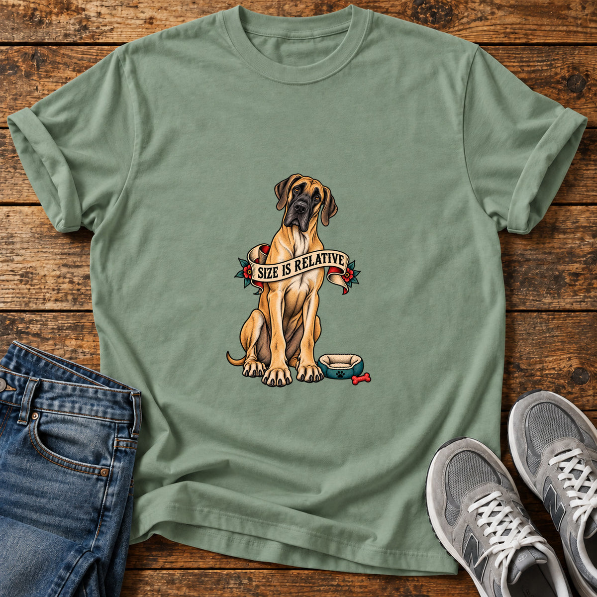 Size Is Relative Great Dane graphic T-shirt in Sage, shown on a flat-lay shirt mockup