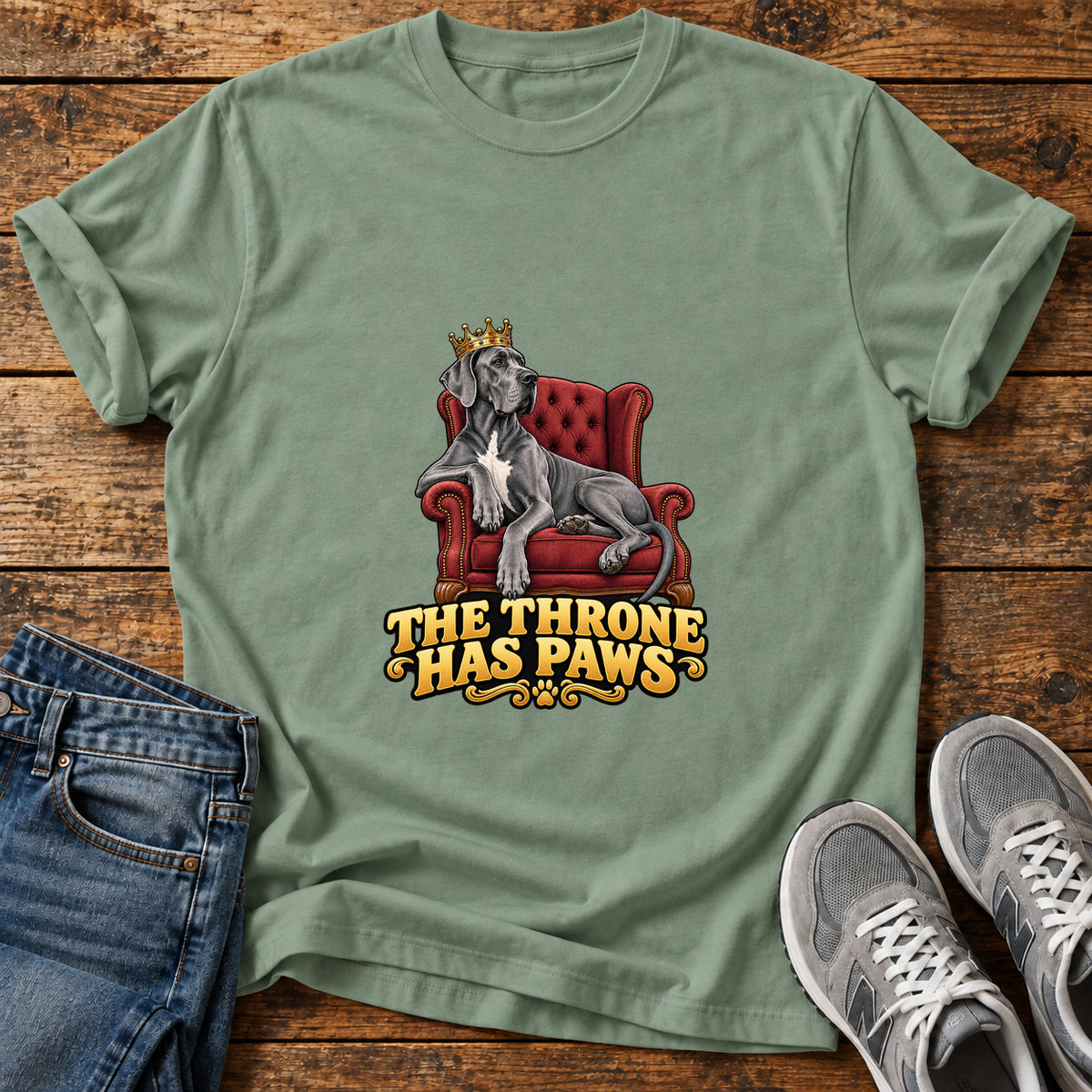 Throne Paws Majesty Great Dane graphic T-shirt in Sage, shown on a flat-lay shirt mockup
