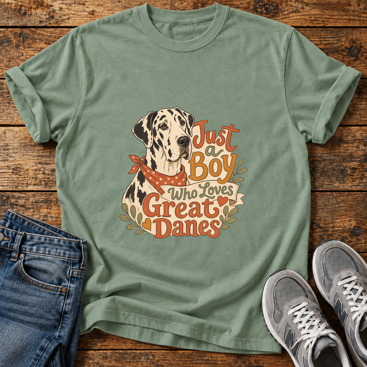 Just a Boy Great Dane graphic T-shirt in Sage, shown on a flat-lay shirt mockup