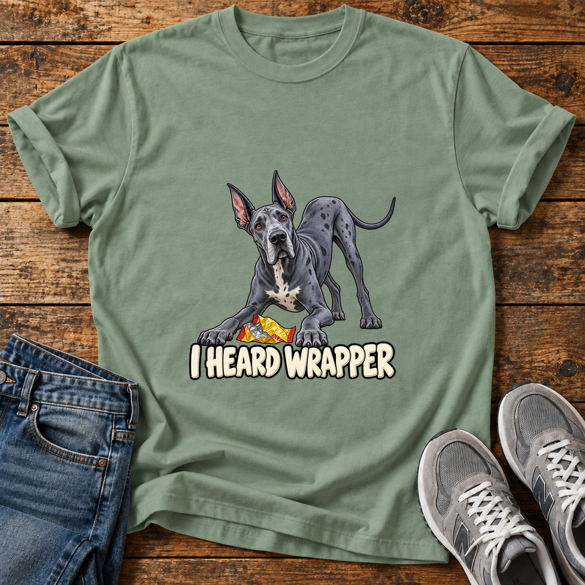 I Heard Wrapper Great Dane graphic T-shirt in Sage, shown on a flat-lay shirt mockup