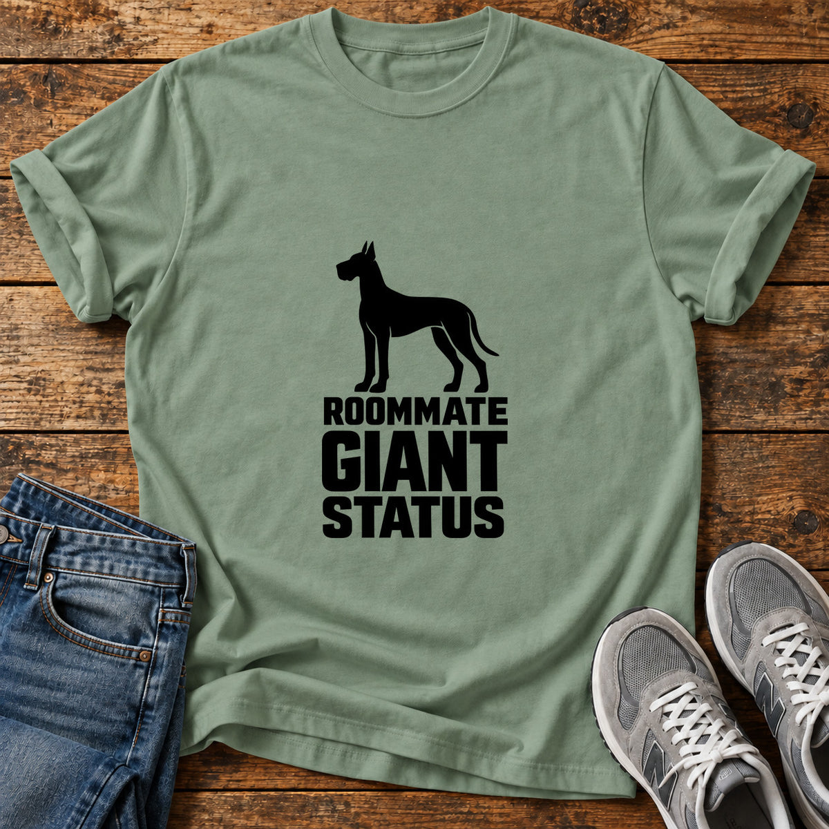 Roommate Giant Status Great Dane graphic T-shirt in Sage, shown on a flat-lay shirt mockup