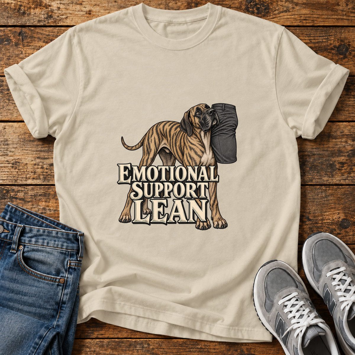 Emotional Support Lean Great Dane graphic T-shirt in Sand, shown on a flat-lay shirt mockup