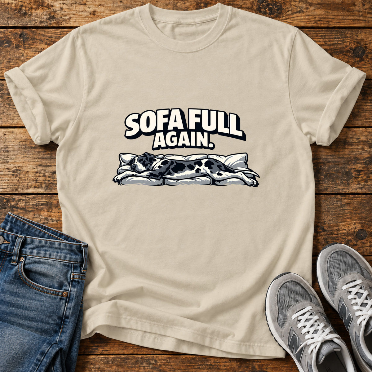 Sofa Full Again Great Dane graphic T-shirt in Sand, shown on a flat-lay shirt mockup