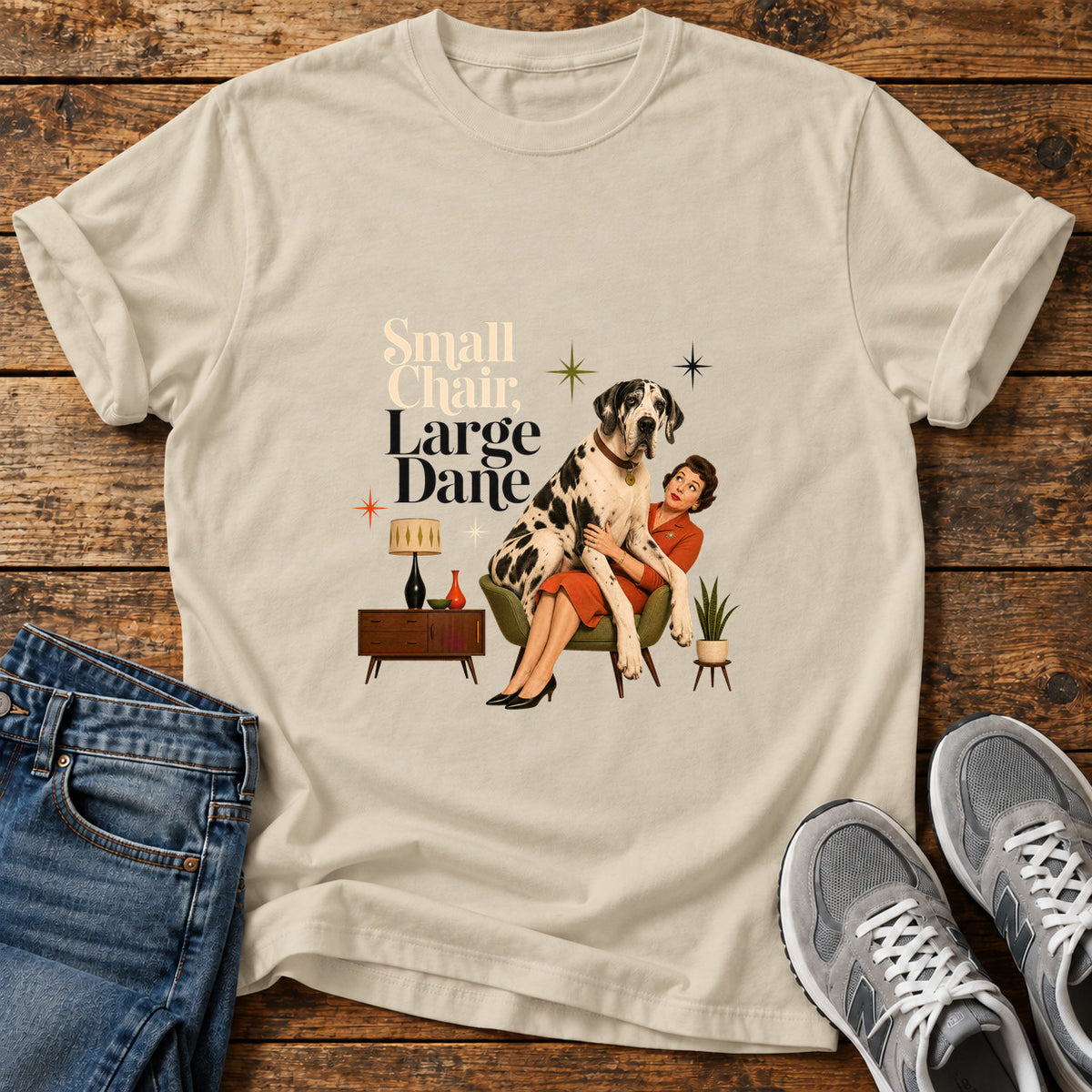 Small Chair Great Dane graphic T-shirt in Sand, shown on a flat-lay shirt mockup