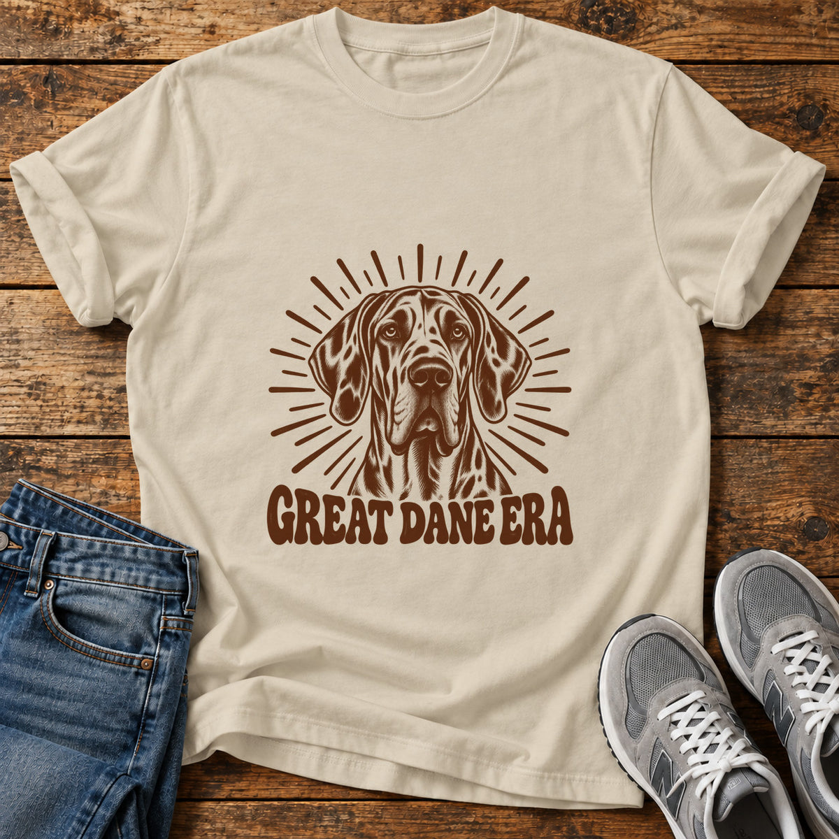 Great Dane Era graphic T-shirt in Sand, shown on a flat-lay shirt mockup
