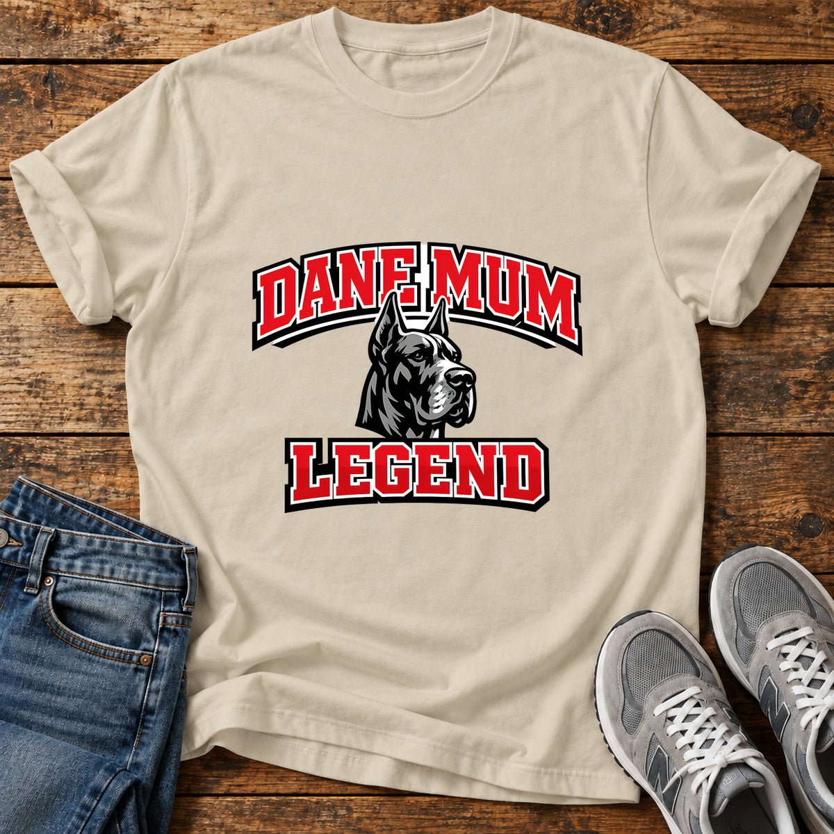 Dane Mum Legend Great Dane graphic T-shirt in Sand, shown on a flat-lay shirt mockup