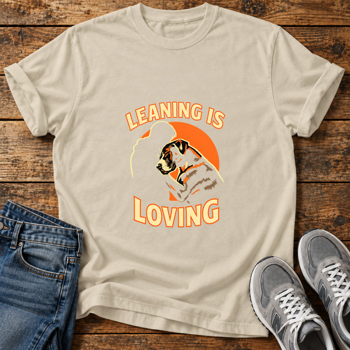 Leaning Is Loving Great Dane graphic T-shirt in Sand, shown on a flat-lay shirt mockup