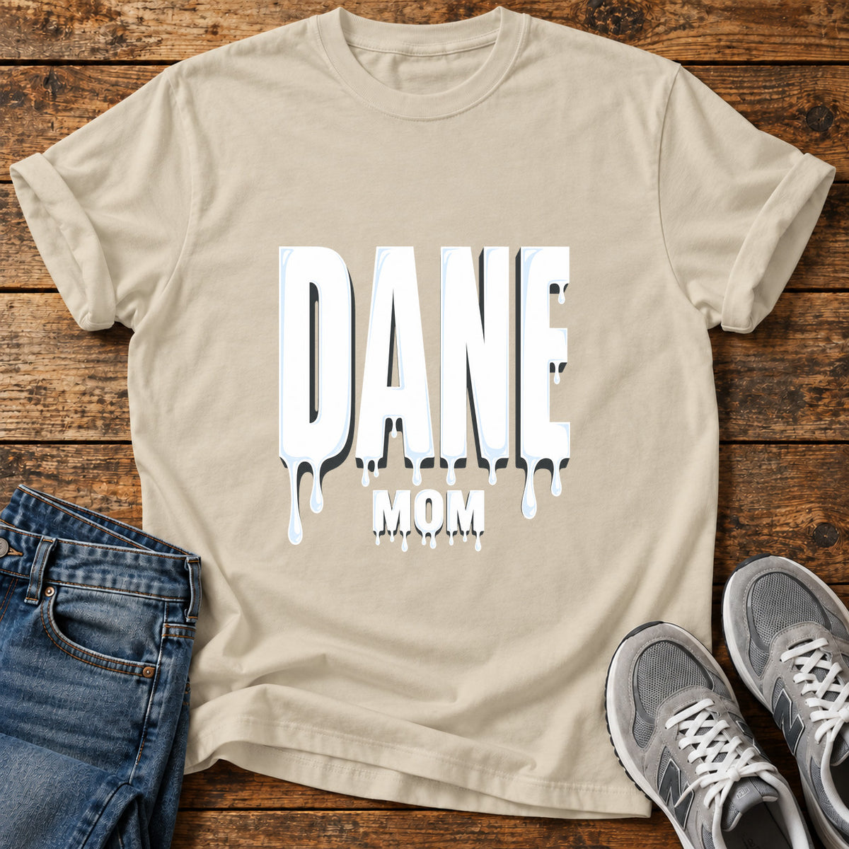 Dane Mom Great Dane graphic T-shirt in Sand, shown on a flat-lay shirt mockup