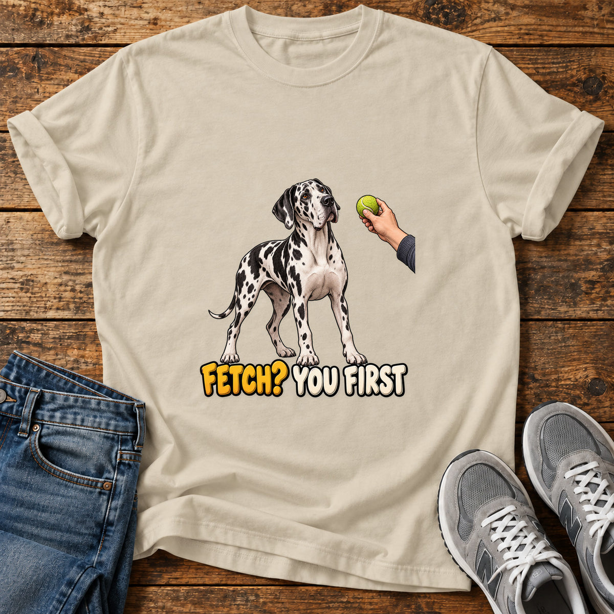 Fetch You First Great Dane graphic T-shirt in Sand, shown on a flat-lay shirt mockup