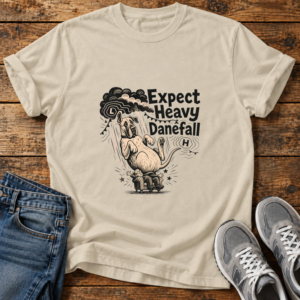 Expect Danefall Great Dane graphic T-shirt in Sand, shown on a flat-lay shirt mockup