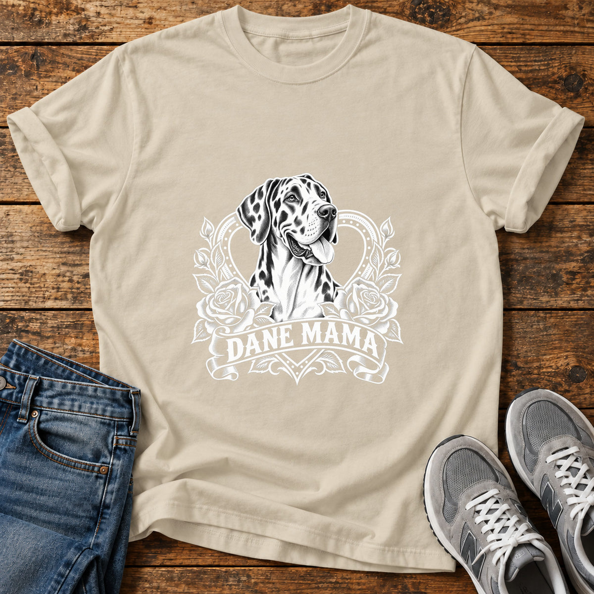 Dane Mama Great Dane graphic T-shirt in Sand, shown on a flat-lay shirt mockup