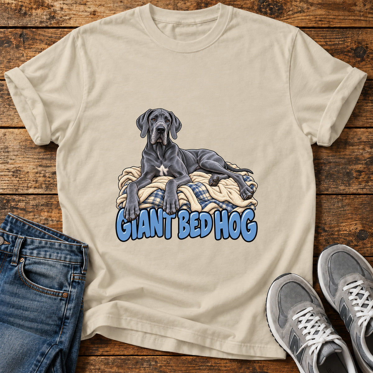 Giant Bed Hog Great Dane graphic T-shirt in Sand, shown on a flat-lay shirt mockup