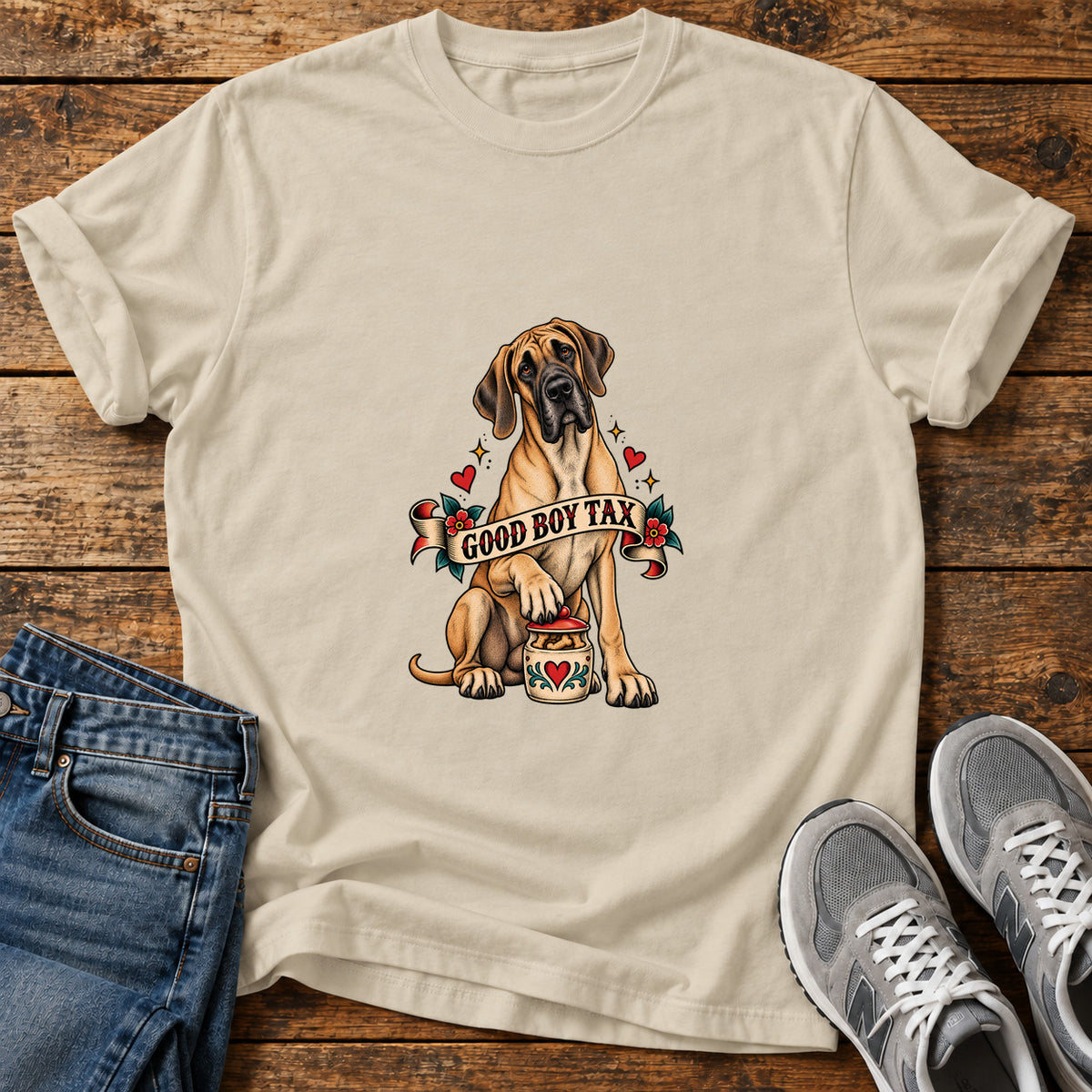 Good Boy Tax Great Dane graphic T-shirt in Sand, shown on a flat-lay shirt mockup