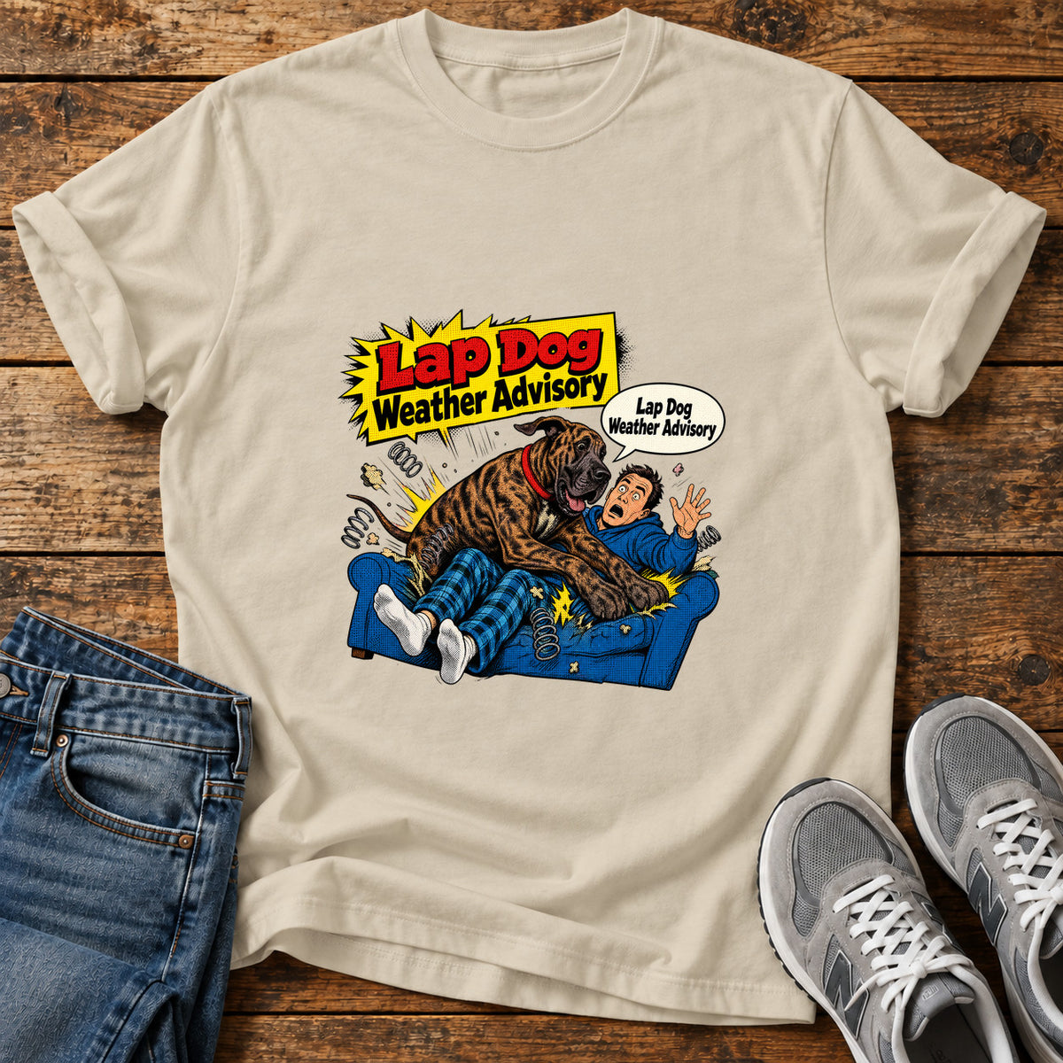 Lap Dog Advisory Great Dane graphic T-shirt in Sand, shown on a flat-lay shirt mockup