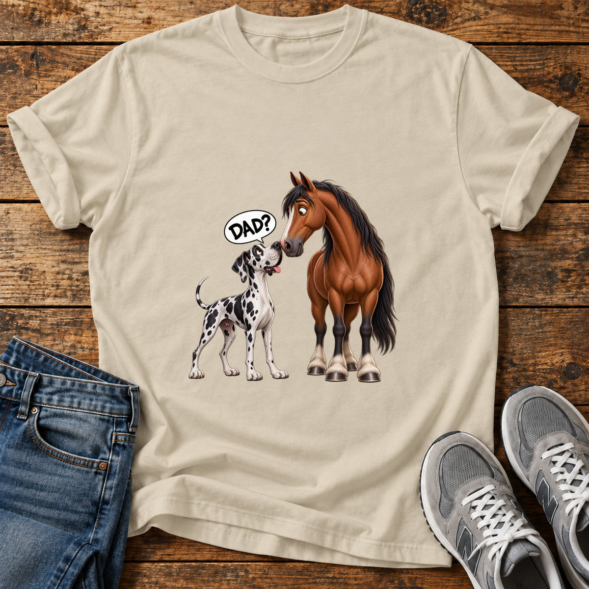 Dad Question Great Dane graphic T-shirt in Sand, shown on a flat-lay shirt mockup