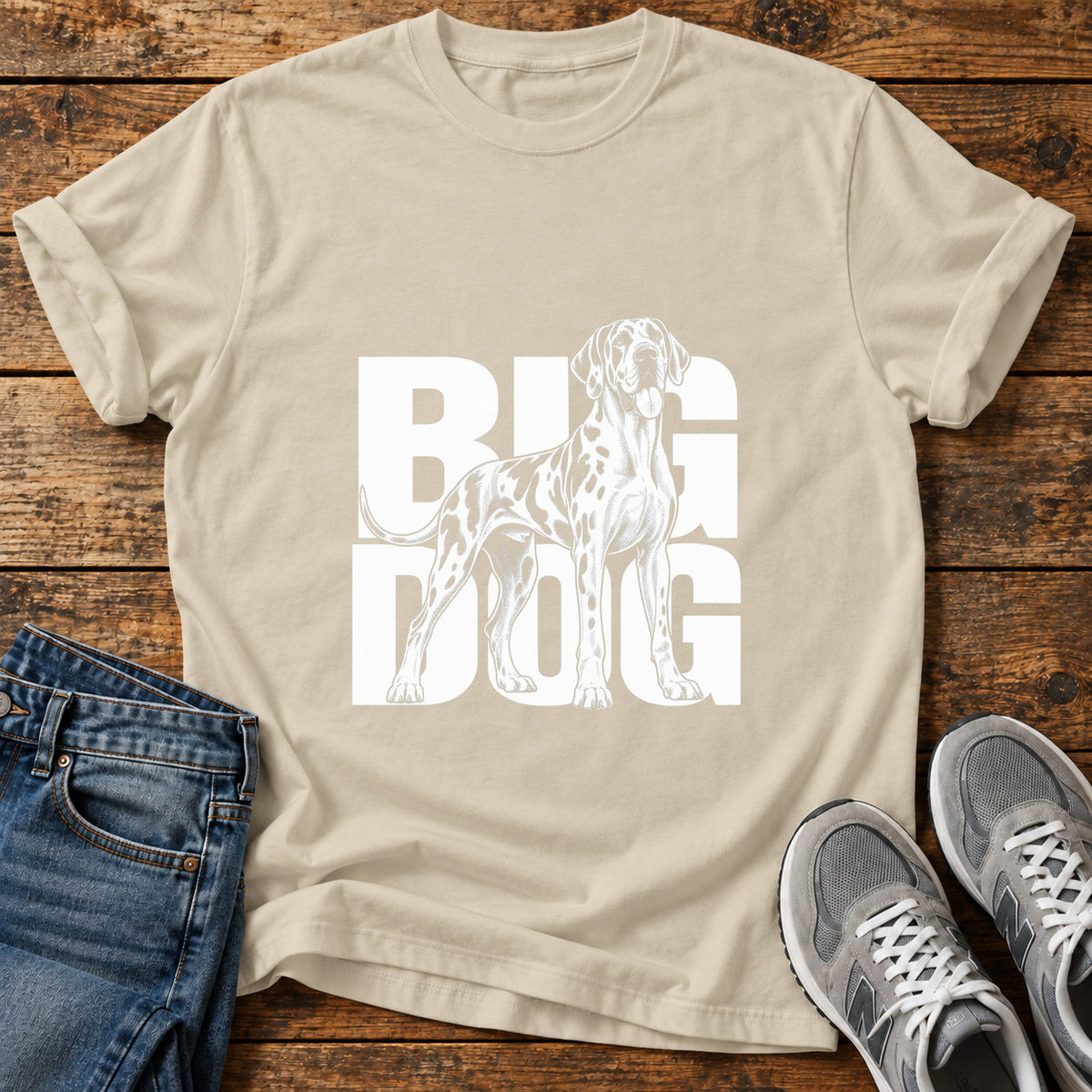 Big Dog Great Dane graphic T-shirt in Sand, shown on a flat-lay shirt mockup