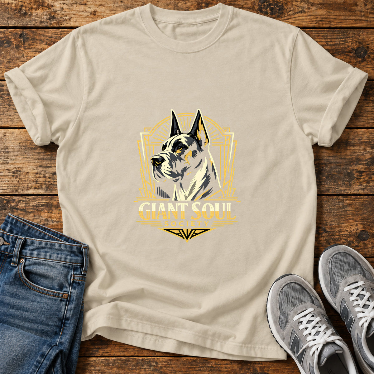 Giant Soul Society Great Dane graphic T-shirt in Sand, shown on a flat-lay shirt mockup