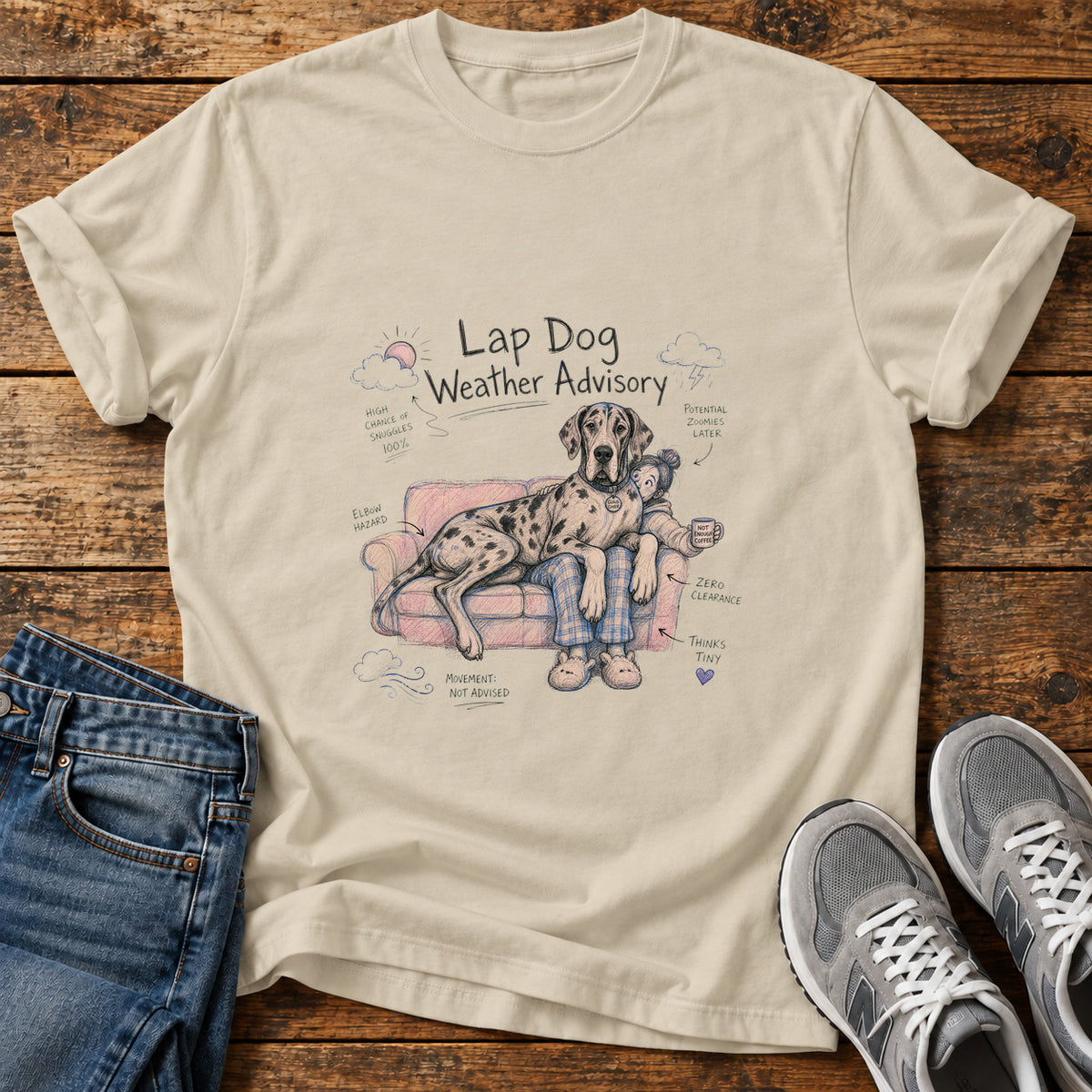 Lap Dog Advisory Great Dane graphic T-shirt in Sand, shown on a flat-lay shirt mockup