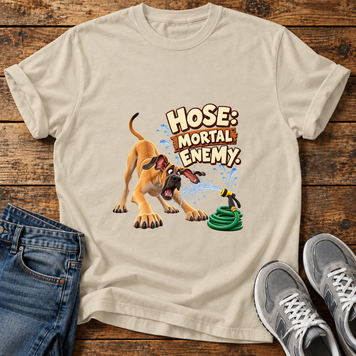 Hose Mortal Enemy Great Dane graphic T-shirt in Sand, shown on a flat-lay shirt mockup