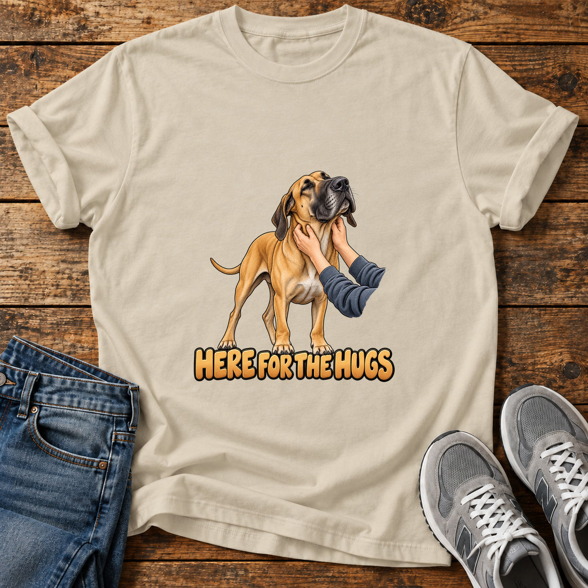 Here For Hugs Great Dane graphic T-shirt in Sand, shown on a flat-lay shirt mockup